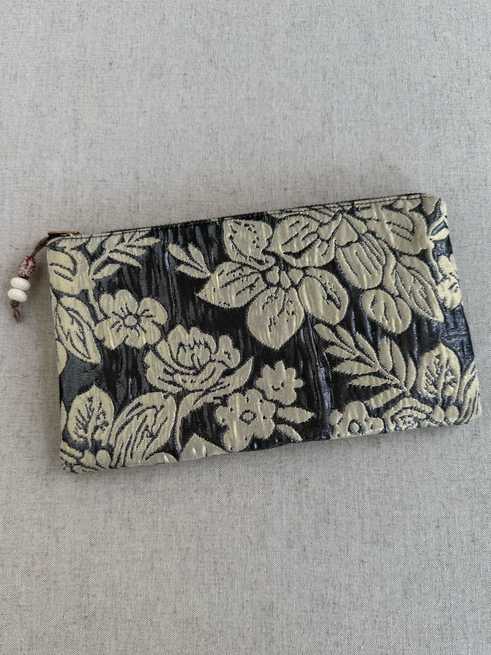 Anthropologie Metallic Floral Embossed Zip Pouch | Cosmetic & Travel Bag